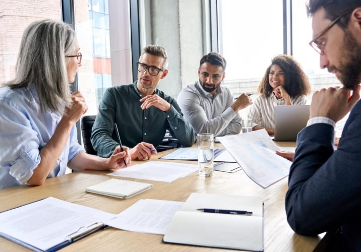 Diverse,International,Executive,Business,Partners,Group,Discuss,Report,At,Boardroom
